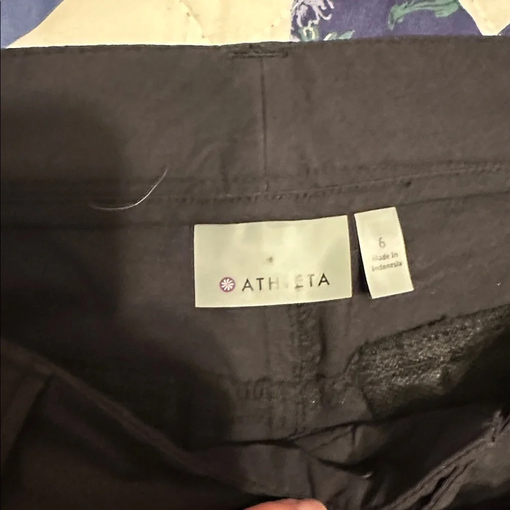 Athleta Charcoal flared Pants. Zippered pocket on lower leg. Side pockets - Picture 2 of 4